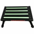 A BLACK Illuminous single folding portable caravan camping step with green silicone grips on its slats to prevent slipping, featuring a single folding mechanism for different viewing angles.