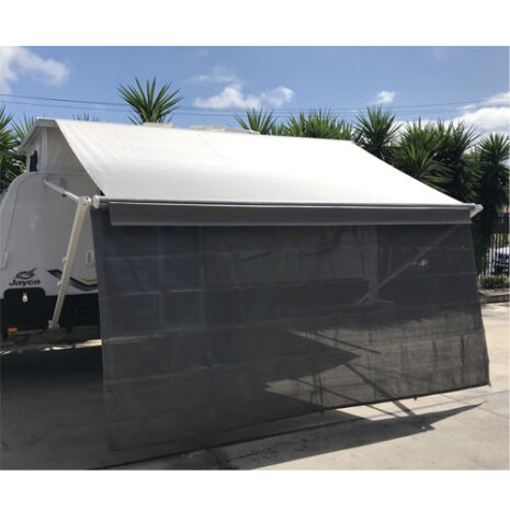 A 3.11m Caravan privacy screen sun shade wall to suit 11ft awning parked in a parking lot with a awning.