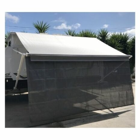 A rv parked in a parking lot with a 4.57m Caravan privacy screen sun shade wall to suit 16ft awning.