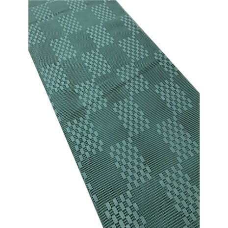A GREEN 4m x 2.5m Caravan RV Motor home Annex Matting Floor Mat with a checkered pattern.