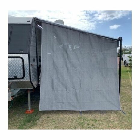 A caravan privacy screen end wall / side sun shade with a screen on the side of it.
