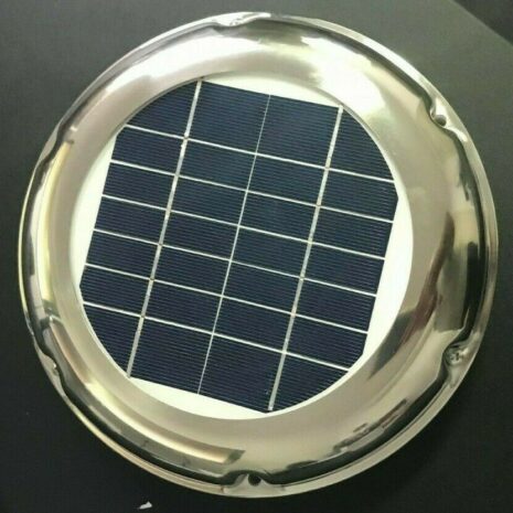 A round Chrome 2.5w Solar Power Ventilation Fan on a surface (requires sunlight for operation).